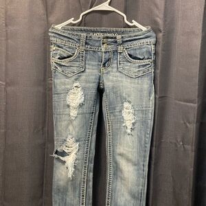 Low rise light blue jeans, size: S, worn but in good condition, ripped jeans.